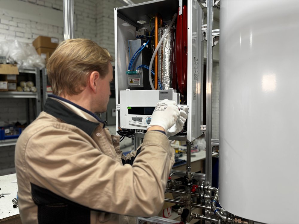 A Gas Safe engineer fitting a new boiler