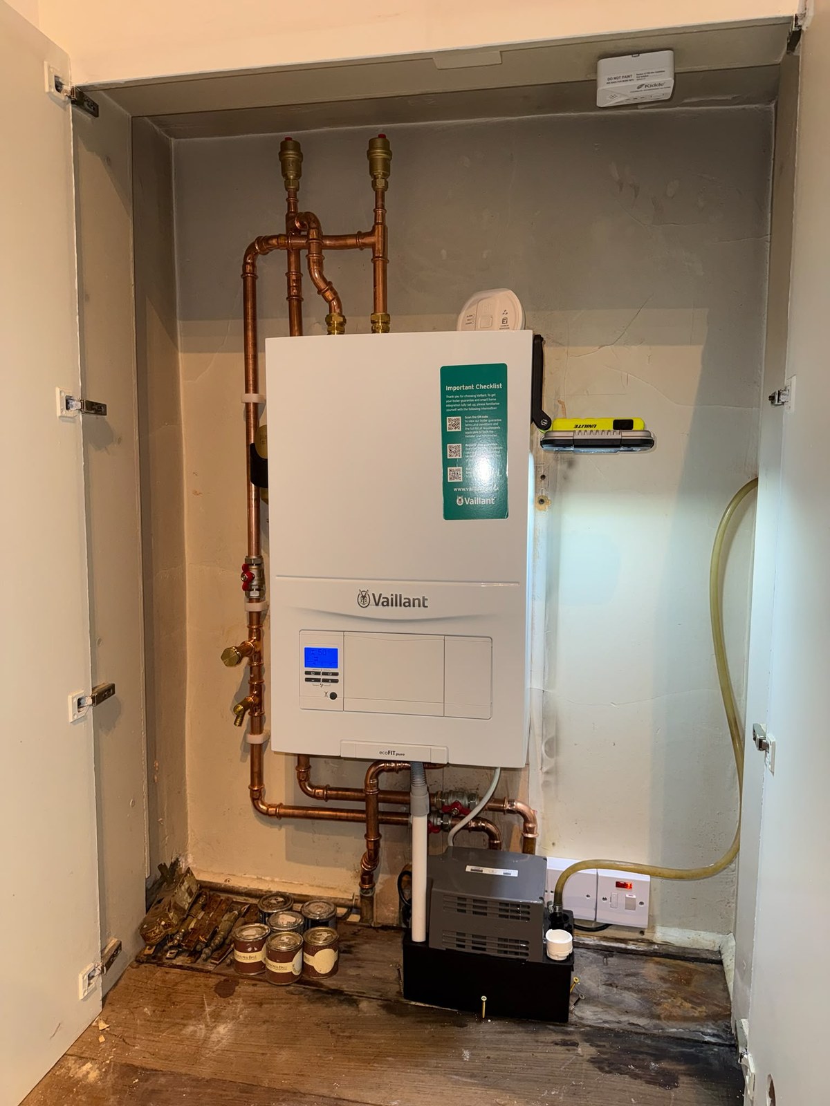 Vaillant ecoFIT boiler installed in a cupboard